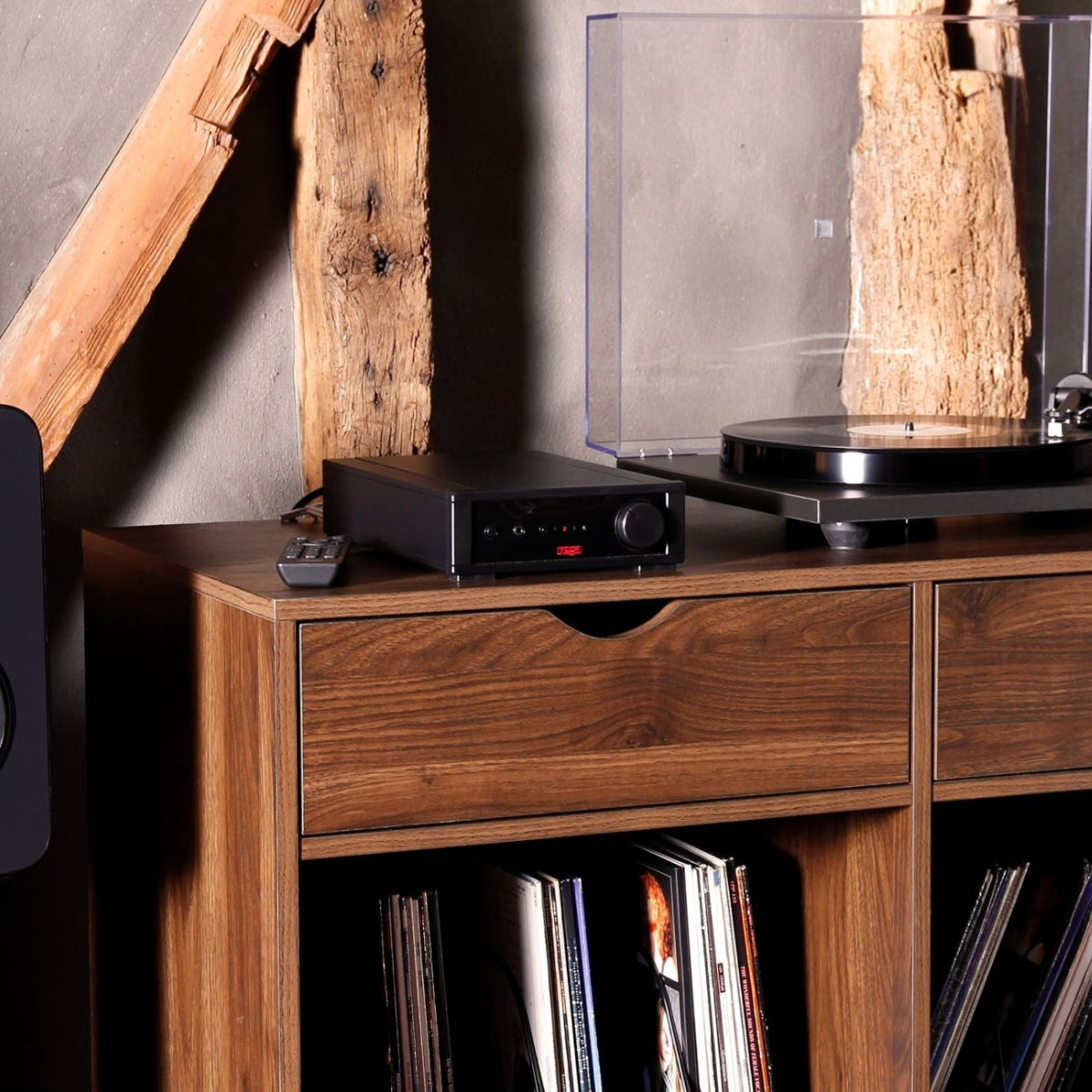 Rega io Integrated Amplifier with turntables on cabinet