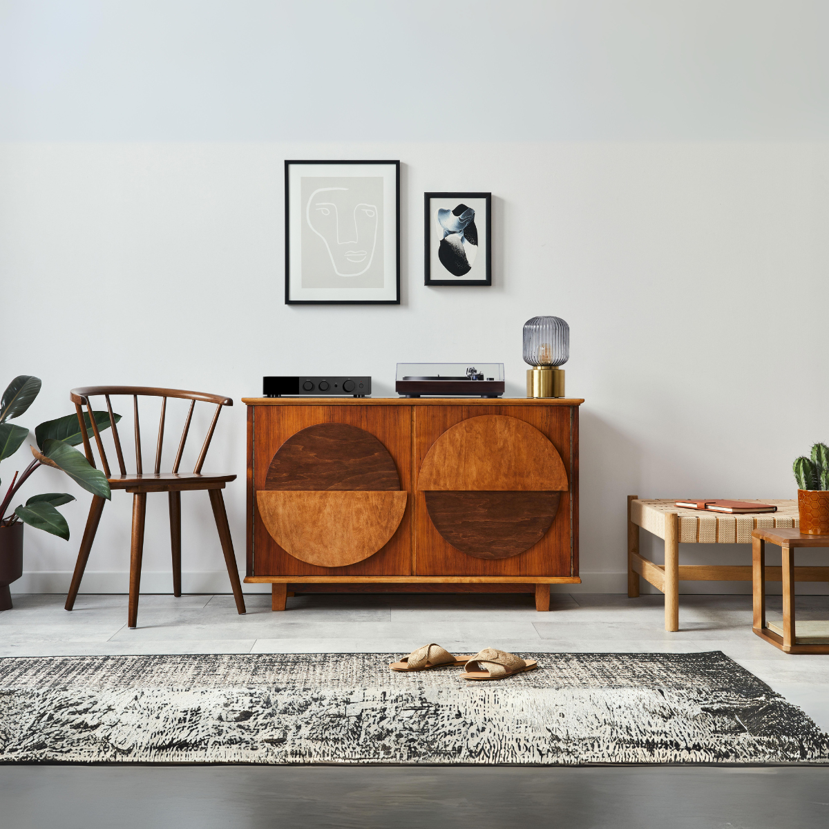 Dual cs618q direct drive turntable in black On cabinet in loungeroom #colour_dark walnut